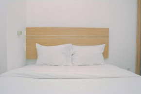 Furnished and Relaxing 2BR Bassura City Apartment near Mall By Travelio